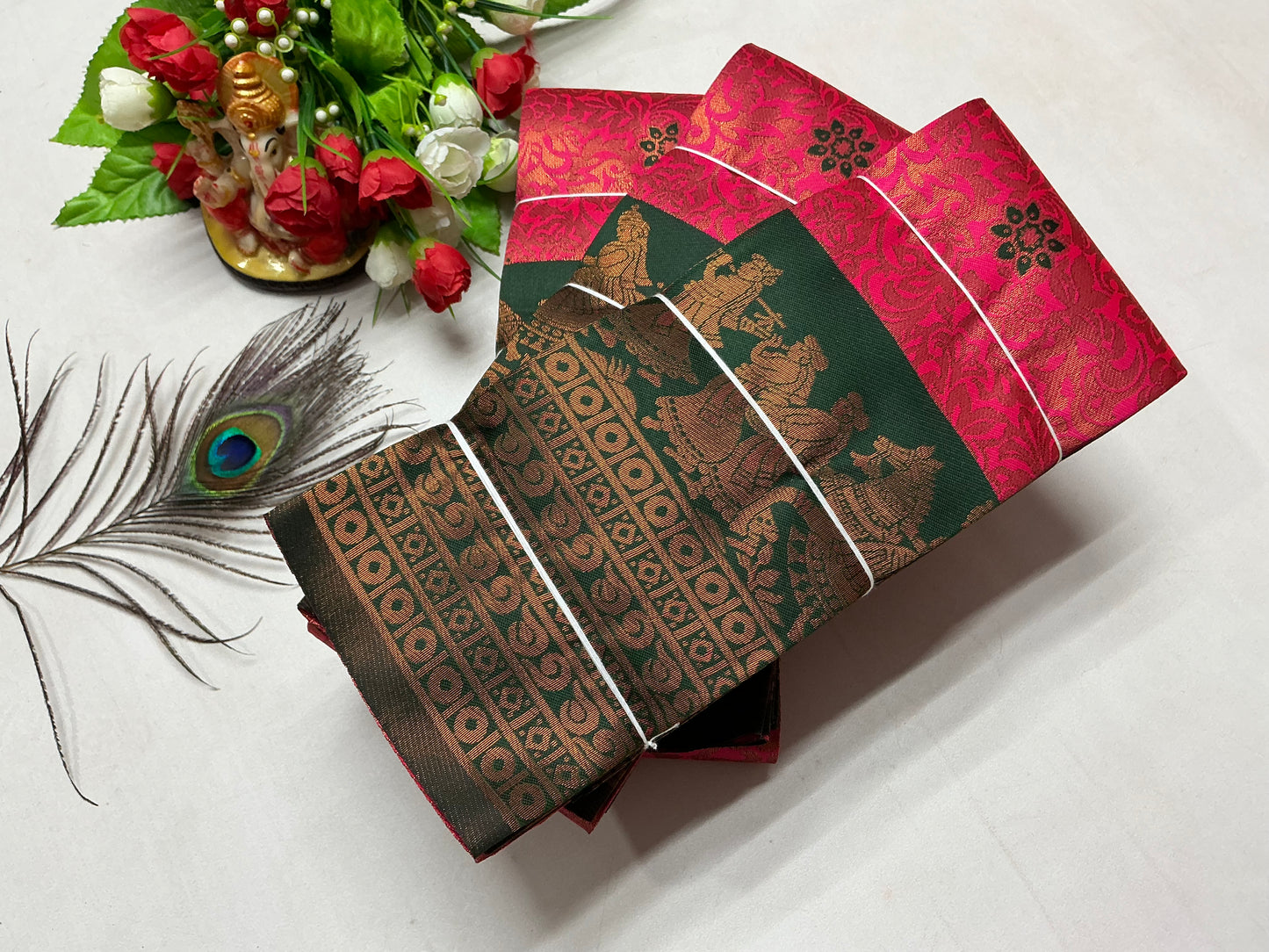 Bridal Silk Saree β Red with Dark Green Radha Krishna Temple Border