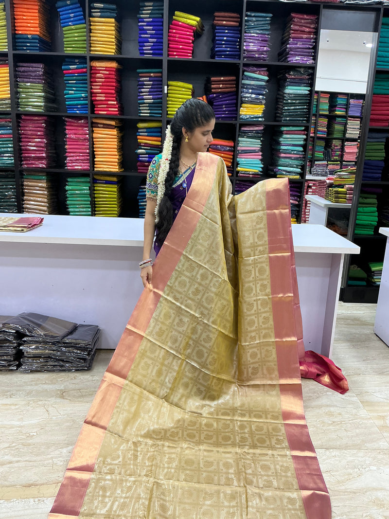 Elegant Nita Ambani Inspired Heritage Saree | Gold Tissue with Rose Pink Border | Sri Nandhini Tex
Code: SNTNA001 ✨