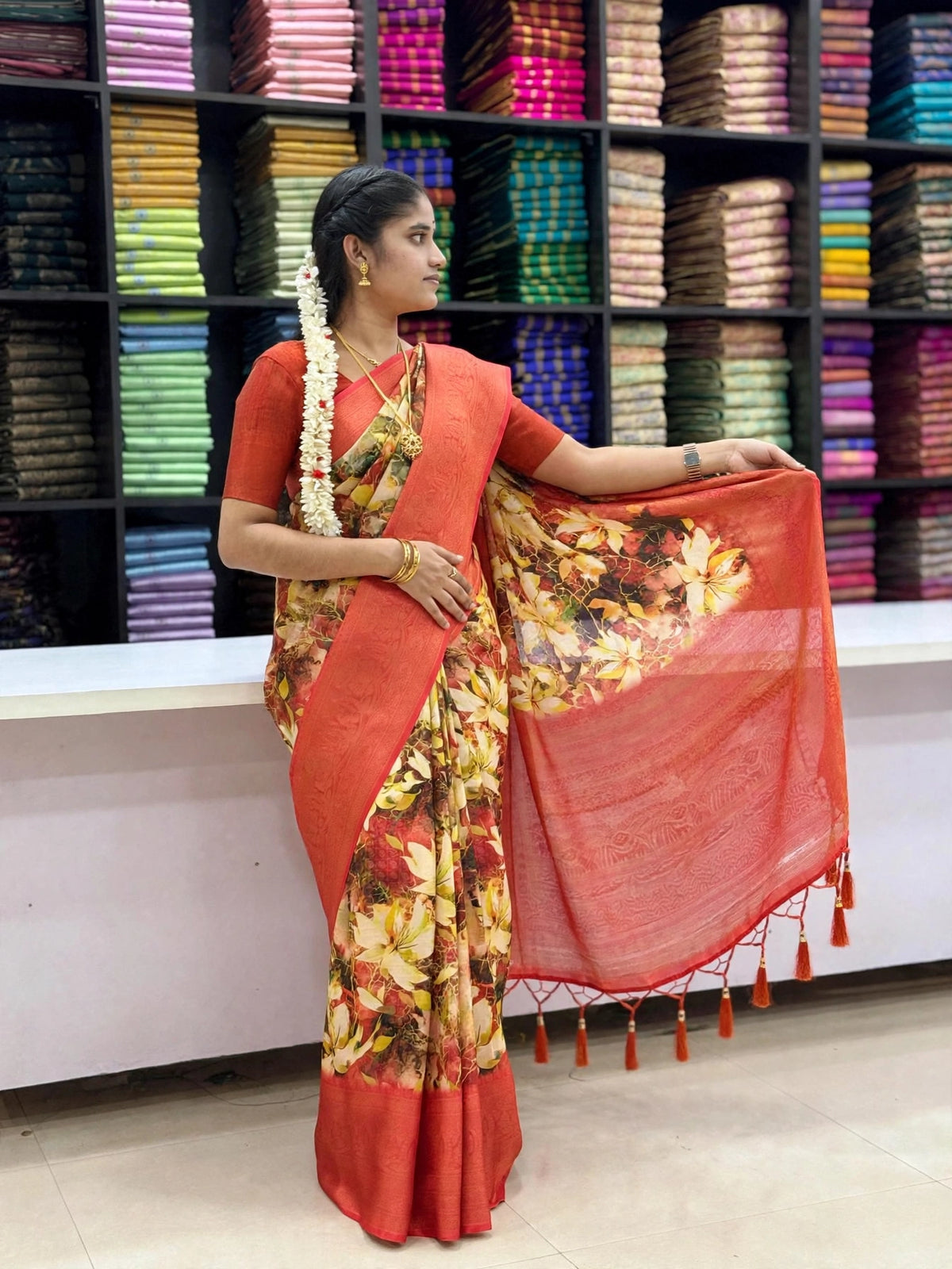 Rust Orange Floral Print Designer Saree with Broad Border & Tassel Pallu | SNTFL103 | Sri Nandhini Tex