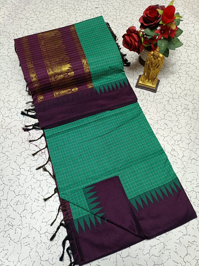 Kalyani Cotton Saree in Bottle Green with Deep Purple Contrast Border and Elegant Zari Weaving for Traditional Occasion Wear