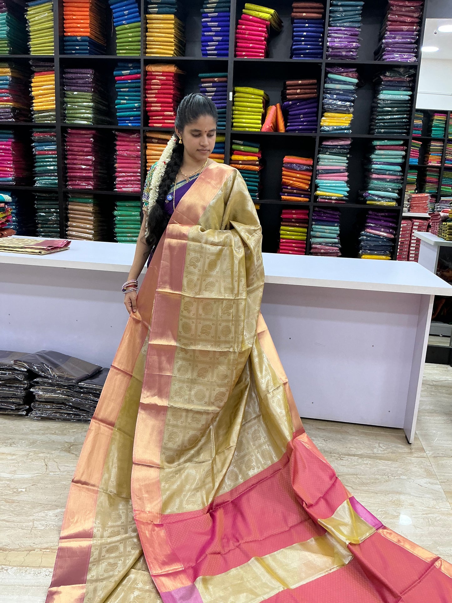Elegant Nita Ambani Inspired Heritage Saree | Gold Tissue with Rose Pink Border | Sri Nandhini Tex
Code: SNTNA001 ✨