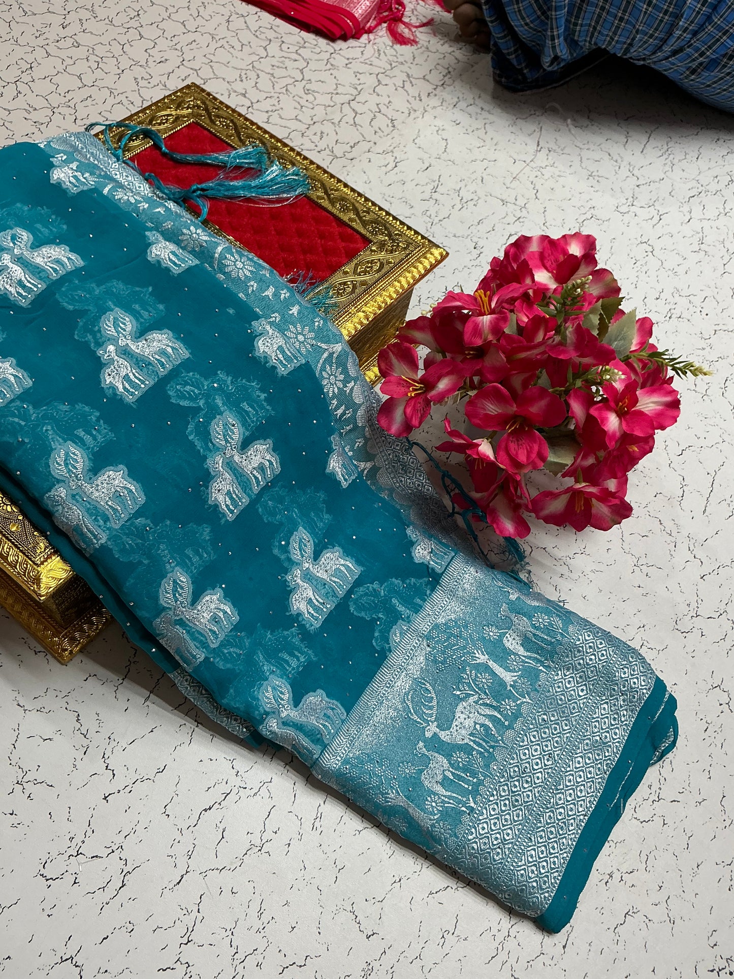 Georgette fancy saree peacock blue with silver deers