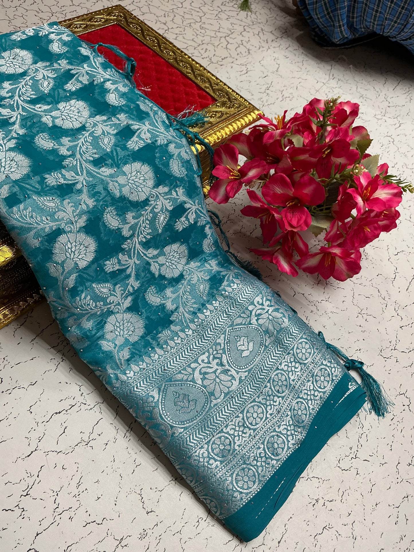 Georgette fancy saree with peacock blue with silver flowers