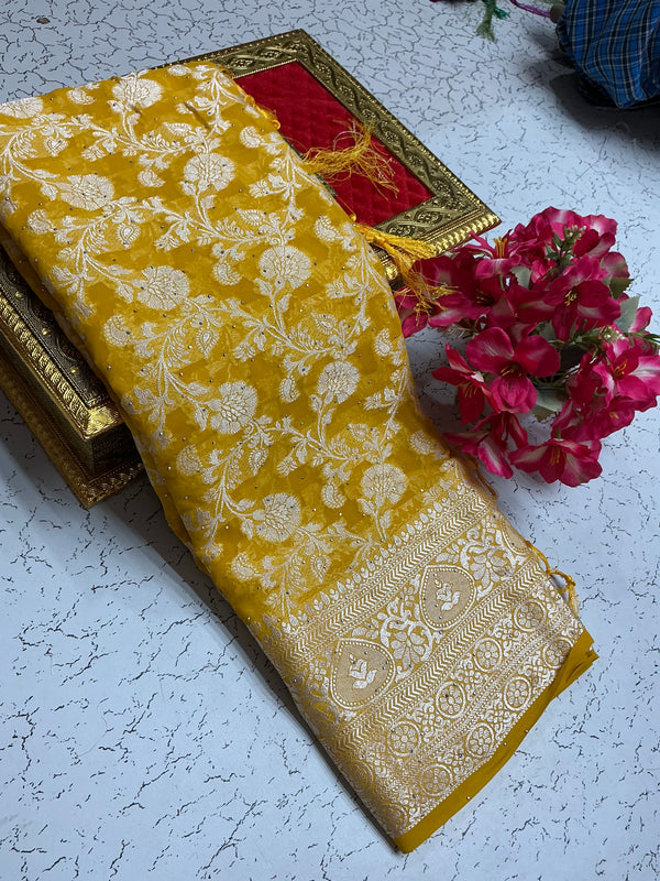 Georgette fancy saree with yellow and silver flowers