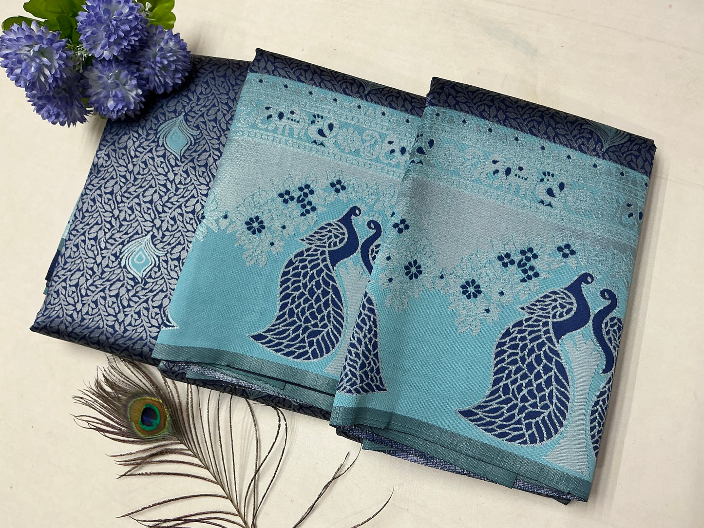 Silver Bridal Saree with Sky Blue Body and Navy Peacock Motif