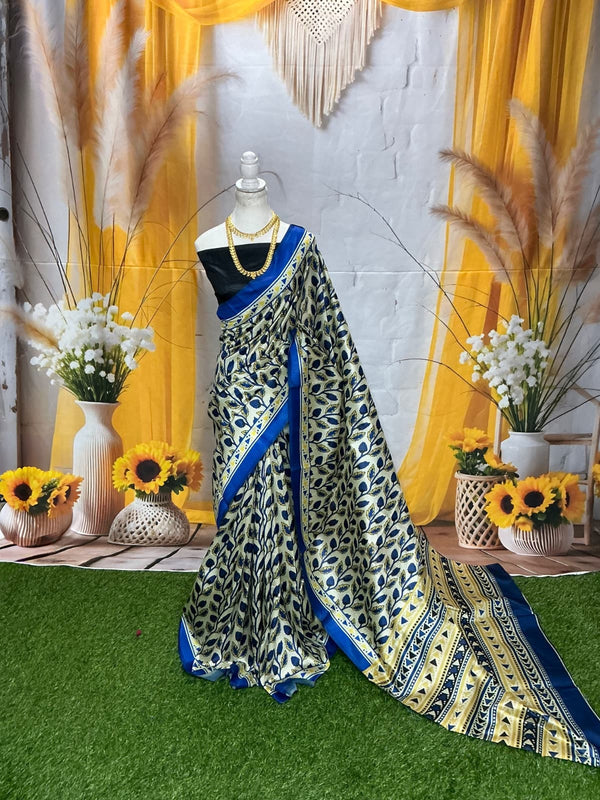 Dola Silk – Royal Blue – Leaf Jari Pattern
(Blue and gold saree with leaf motifs and elegant zari border)