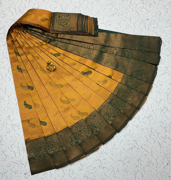 Kubera Bridal Silk Saree — Mustard Gold with Dark Green Border & Peacock Zari Motifs